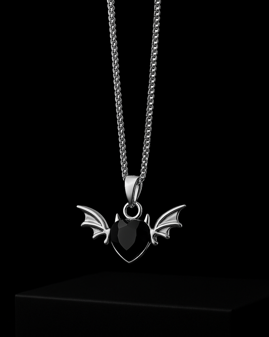 Blackdevil Heart Pendant with a bat-shaped pendant on a black background