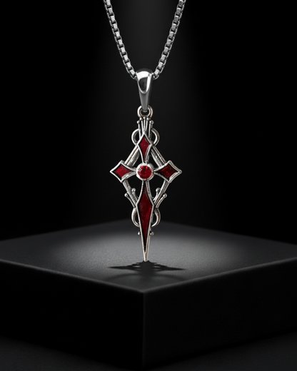 Crypt Bloom Pendant with red gemstones on a black background