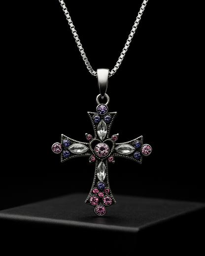 Gothic Nexa Cross Pendant with colorful stones on a black background