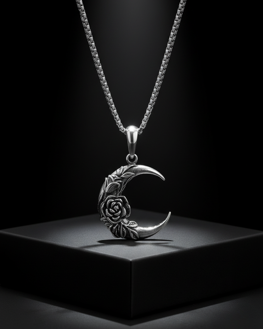 Silver Midnight Rosemoon Pendant with floral design on a black background
